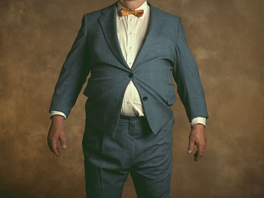 Толстый мужчина в костюме фото